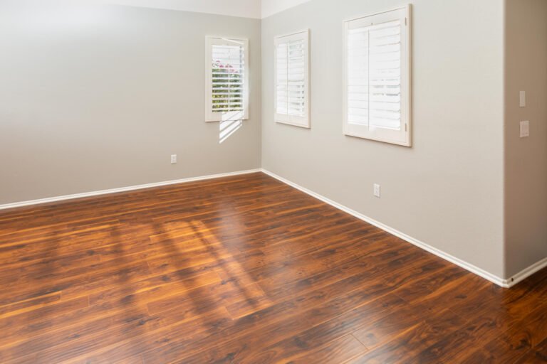 newly-installed-brown-laminate-flooring-and-basebo-Q9HCKPU